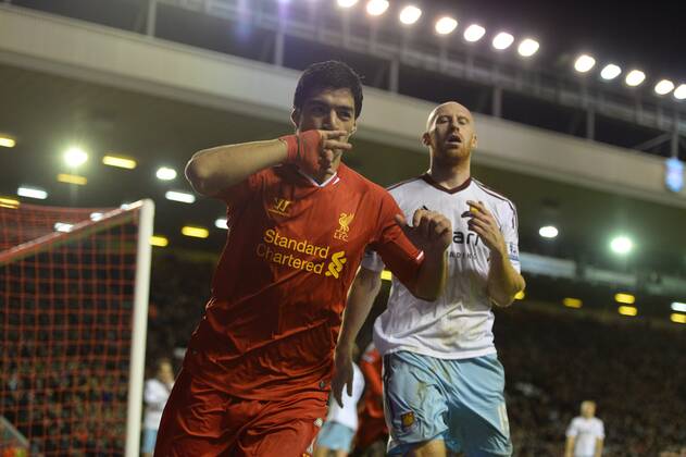 Luis Suarez of Liverpool celebrates the third goal - Barclays Premier League - Liverpool vs West Ham Utd - Anfield Stadium - Liverpool - England - 7th December 2013 - Picture Simon Bellis Sportimage EDITORIAL USE ONLY. No use with unauthorised audio, video, data, fixture lists, club league logos or live services. Online in-match use limited to 120 images, no video emulation. No use in betting, games or single club league player publications.