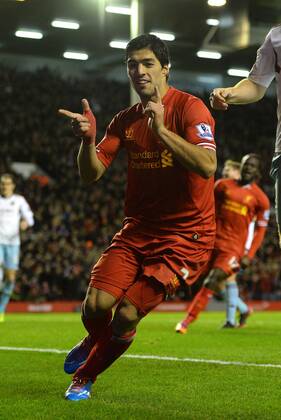 Luis Suarez of Liverpool celebrates the third goal - Barclays Premier League - Liverpool vs West Ham Utd - Anfield Stadium - Liverpool - England - 7th December 2013 - Picture Simon Bellis Sportimage EDITORIAL USE ONLY. No use with unauthorised audio, video, data, fixture lists, club league logos or live services. Online in-match use limited to 120 images, no video emulation. No use in betting, games or single club league player publications.