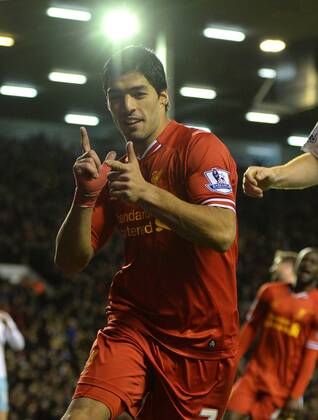 Luis Suarez of Liverpool celebrates the third goal - Barclays Premier League - Liverpool vs West Ham Utd - Anfield Stadium - Liverpool - England - 7th December 2013 - Picture Simon Bellis Sportimage EDITORIAL USE ONLY. No use with unauthorised audio, video, data, fixture lists, club league logos or live services. Online in-match use limited to 120 images, no video emulation. No use in betting, games or single club league player publications.