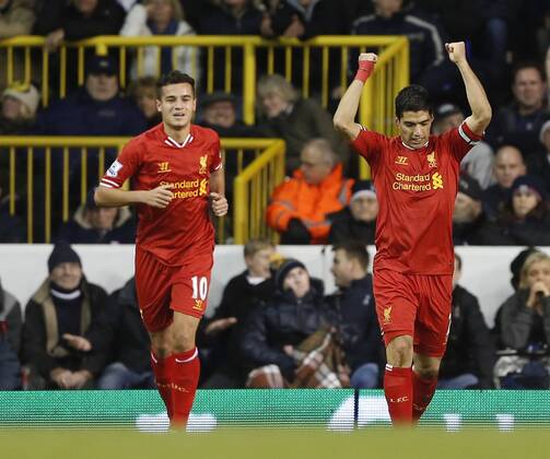 Liverpool s Luis Suarez celebrates scoring his sides opening goal Tottenham Hotspur vs Liverpool FC - Premier League - White Hart Lane - London - England - 15 12 2013 - Pic DavidxKlein Sportimage EDITORIAL USE ONLY. No use with unauthorised audio, video, data, fixture lists, club league logos or live services. Online in-match use limited to 120 images, no video emulation. No use in betting, games or single club league player publications.