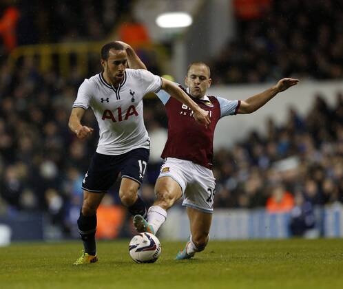 Tottenham s Andros Townsend tussles with West Ham s Joe Cole Tottenham Hotspur vs West Ham United - League Cup - White Hart Lane - London - England - 18 12 2013 - Pic David Klein Sportimage EDITORIAL USE ONLY. No use with unauthorised audio, video, data, fixture lists, club league logos or live services. Online in-match use limited to 120 images, no video emulation. No use in betting, games or single club league player publications.