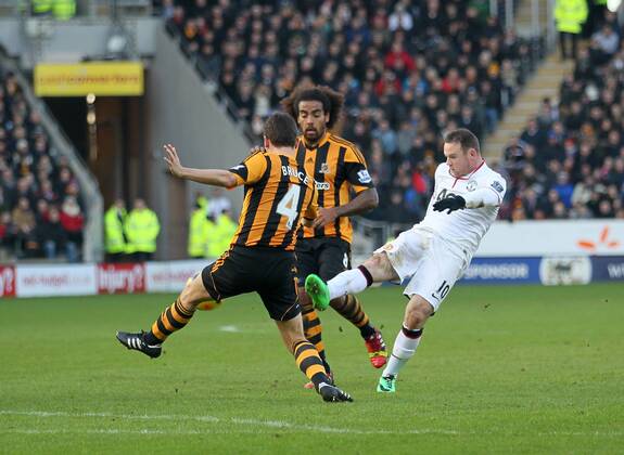 Manchester United s Wayne Roney scoring his sides second goal Hull City vs Manchester United - Premier League - KC Stadium - London - England - 26 12 2013 - Pic David Klein Sportimage EDITORIAL USE ONLY. No use with unauthorised audio, video, data, fixture lists, club league logos or live services. Online in-match use limited to 120 images, no video emulation. No use in betting, games or single club league player publications.