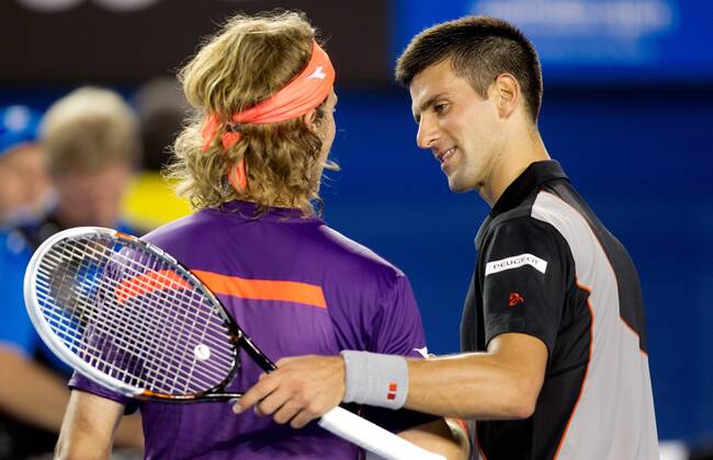 TENNIS - ATP, Australian Open 2014 MELBOURNE,AUSTRALIEN,13.JAN.14 - TENNIS - ATP Tennis Herren World Tour, Grand Slam, Australian Open. Bild zeigt Lukas Lacko (SVK) und Novak Djokovic (SRB).