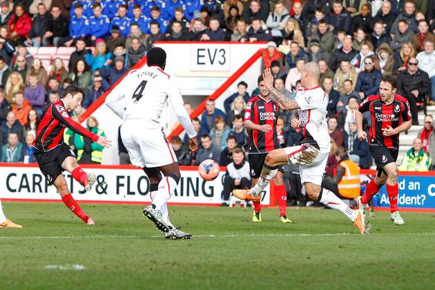 Football - 2013 2014 FA Cup - Fourth Round: AFC Bournemouth vs. FC Liverpool - Bournemouth s Harry Arter has a shot deflected for a corner by Martin Skrtel of Liverpool - 
