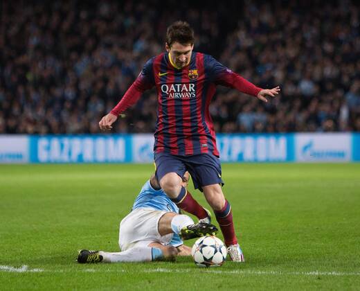 Martin Demichelis of Manchester City brings down Lionel Messi of Barcelona to earn a red card - UEFA Champions League First Knockout Round - Manchester City vs Barcelona - Etihad Stadium - Manchester - England - 18th February 2014 - Picture Phil Oldham Sportimage EDITORIAL USE ONLY. No use with unauthorised audio, video, data, fixture lists, club league logos or live services. Online in-match use limited to 120 images, no video emulation. No use in betting, games or single club league player publications.
