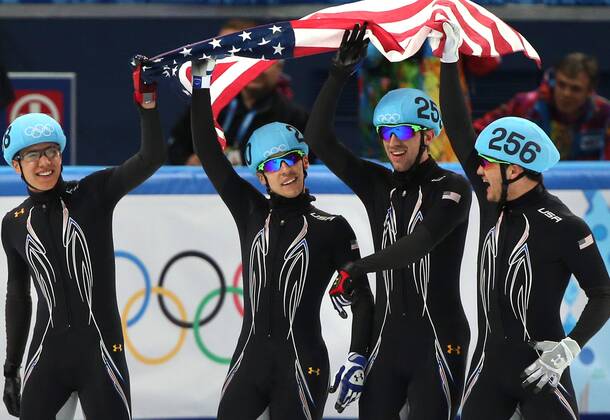 The U.S. team celebrates after winning the silver medal during the short track: men s 5000m relay during the Sochi Winter Olympics on February 21, 2014..  OLY20140221502