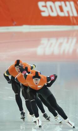 ITAR-TASS: SOCHI, RUSSIA. FEBRUARY 22, 2014. Dutch Jan Blokhuijsen, Sven Kramer and Koen Verweij (L-R) compete to win gold in the men s speed skating team pursuit event at the 22nd Winter Olympic Games at the Adler Arena Skating Center.  RE13AB4B
