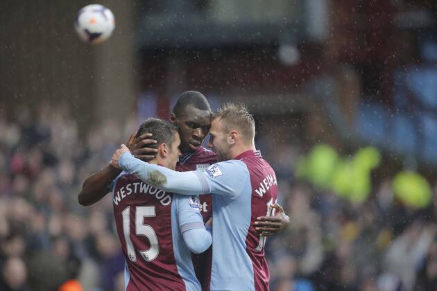 Christian Benteke of Aston Villa celebrates scoring the second goal of the game for his side - Footballl - Barclays Premier League - Aston Villa vs Norwich City - Villa Park Birmingham - Season 2013 14 - 2nd March 2014 EDITORIAL USE ONLY. No use with unauthorised audio, video, data, fixture lists, club league logos or live services. Online in-match use limited to 120 images, no video emulation. No use in betting, games or single club league player publications.