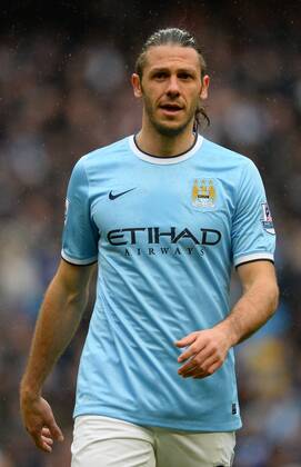 Martin Demichelis of Manchester City - Barclays Premier League - Manchester City vs Fulham - Etihad Stadium - Manchester - England - 22nd March 2014 - Pic Simon Bellis Sportimage EDITORIAL USE ONLY. No use with unauthorised audio, video, data, fixture lists, club league logos or live services. Online in-match use limited to 120 images, no video emulation. No use in betting, games or single club league player publications.