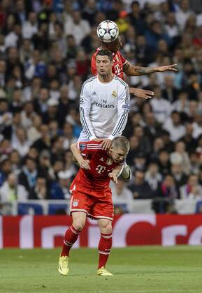 First leg of 1 2 Champions League match between Real Madrid and FC Bayern Munich. In this picture, Jerome Boateng, Cristiano Ronaldo and Bastian Schweinsteiger. xDIEGOxGxSOUTOx 