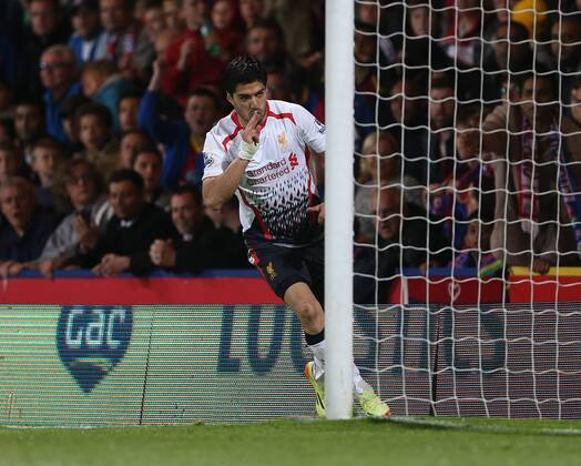 Liverpool s Luis Suarez celebrates scoring his sides third goal Crystal Palace vs FC Liverpool - Barclays Premier League - Selhurst Park - London - UK - 05 05 2014 - EDITORIAL USE ONLY. No use with unauthorised audio, video, data, fixture lists, club league logos or live services. Online in-match use limited to 120 images, no video emulation. No use in betting, games or single club league player publications.