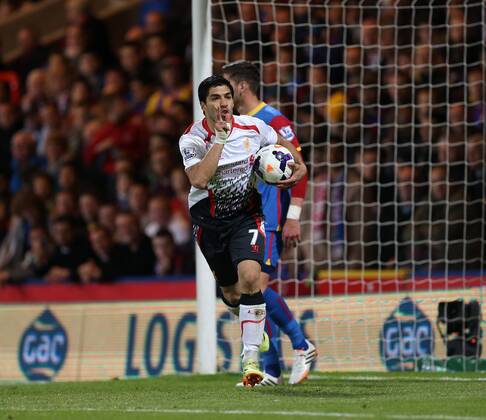 Liverpool s Luis Suarez celebrates scoring his sides third goal Crystal Palace vs FC Liverpool - Barclays Premier League - Selhurst Park - London - UK - 05 05 2014 - EDITORIAL USE ONLY. No use with unauthorised audio, video, data, fixture lists, club league logos or live services. Online in-match use limited to 120 images, no video emulation. No use in betting, games or single club league player publications.