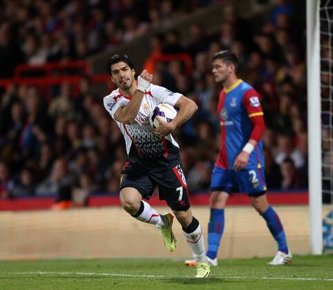 Liverpool s Luis Suarez celebrates scoring his sides third goal Crystal Palace vs FC Liverpool - Barclays Premier League - Selhurst Park - London - UK - 05 05 2014 - EDITORIAL USE ONLY. No use with unauthorised audio, video, data, fixture lists, club league logos or live services. Online in-match use limited to 120 images, no video emulation. No use in betting, games or single club league player publications.