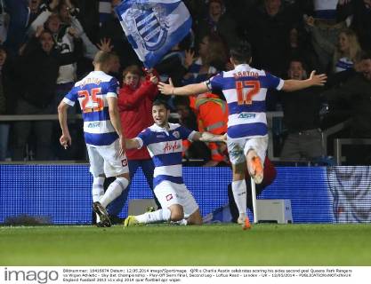 QPR s Charlie Austin celebrates scoring his sides second goal Queens Park Rangers vs Wigan Athletic - Sky Bet Championship - Play-Off Semi Final, Second Leg - Loftus Road - London - UK - 12 05 2014 - EDITORIAL USE ONLY. No use with unauthorised audio, video, data, fixture lists, club league logos or live services. Online in-match use limited to 120 images, no video emulation. No use in betting, games or single club league player publications.