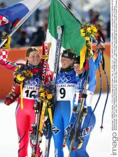 Feb. 17, 2002 - U.S. - KRT SPORTS STORY SLUGGED: OLY-ALPINE KRT PHOTOGRAPH BY RON JENKINS FORT WORTH STAR-TELEGRAM (DALLAS OUT) (February 17) SNOWBASIN, UT-- Womens Super G medal winners from left to right, Croatia s Janica Kostelic (16), silver, Italy s Daniela Ceccarelli (9), gold, and Italy s Karen Putzer (right), bronze, celebrate after the Women s Super-G event at Snowbasin, Utah Sunday February 17, 2002. (FT) BL NC KD 2002 (Vert) (lde) News Archive - Feb. 17, 2002 - ZUMAm67
