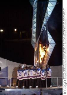 Feb. 8, 2002 - U.S. -- The 1980 US Hockey team, lead by team captain, Mike Eruzione, lights the Olympic cauldron at the Winter Olympic Opening Ceremony Friday February 8, 2002 in Salt Lake City, Utah. (SP) - Feb. 8, 2002 - ZUMAm67
