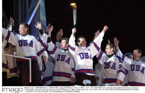 Feb. 8, 2002 - U.S. - The 1980 USA men s hockey team lights the Olympic Cauldron at the Winter Olympic Opening Ceremony Friday February 8, 2002 in Salt Lake City, Utah. (GT) - Feb. 8, 2002 - ZUMAm67
