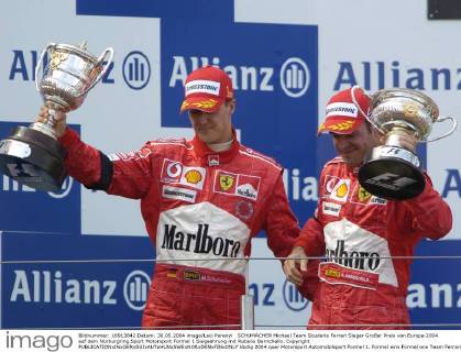 SCHUMACHER Michael Team Scuderia Ferrari Sieger Großer Preis von Europa 2004 auf dem Nürburgring.Sport Motorsport Formel 1 Siegeehrung mit Rubens Barrichello. Copyright