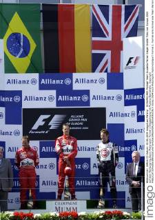 SCHUMACHER Michael Team Scuderia Ferrari Sieger Großer Preis von Europa 2004 auf dem Nürburgring.Sport Motorsport Formel 1 Siegeehrung mit Rubens Barrichello. Copyright