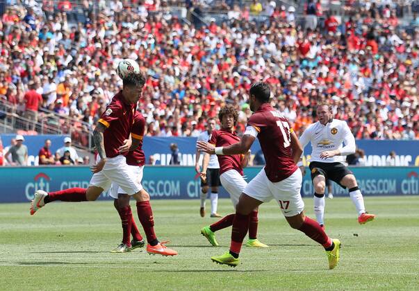 Manchester United s Wayne Rooney scoring his sides opening goal - International Champions Cup 2014 - AS Roma v Manchester United - Sports Authority Field - Denver - USA - 26th July 2014 - Picture David Klein Sportimage EDITORIAL USE ONLY. No use with unauthorised audio, video, data, fixture lists, club league logos or live services. Online in-match use limited to 120 images, no video emulation. No use in betting, games or single club league player publications.