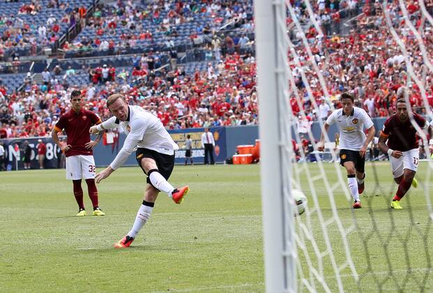 Manchester United s Wayne Rooney scoring his sides third goal - International Champions Cup 2014 - AS Roma v Manchester United - Sports Authority Field - Denver - USA - 26th July 2014 - Picture David Klein Sportimage EDITORIAL USE ONLY. No use with unauthorised audio, video, data, fixture lists, club league logos or live services. Online in-match use limited to 120 images, no video emulation. No use in betting, games or single club league player publications.