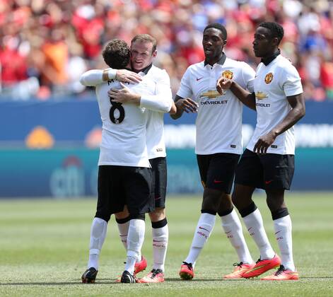 Manchester United s Wayne Rooney celebrates scoring his sides opening goal - International Champions Cup 2014 - AS Roma v Manchester United - Sports Authority Field - Denver - USA - 26th July 2014 - Picture David Klein Sportimage EDITORIAL USE ONLY. No use with unauthorised audio, video, data, fixture lists, club league logos or live services. Online in-match use limited to 120 images, no video emulation. No use in betting, games or single club league player publications.