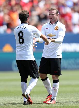 Manchester United s Wayne Rooney celebrates scoring his sides opening goal with Juan Mata - International Champions Cup 2014 - AS Roma v Manchester United - Sports Authority Field - Denver - USA - 26th July 2014 - Picture David Klein Sportimage EDITORIAL USE ONLY. No use with unauthorised audio, video, data, fixture lists, club league logos or live services. Online in-match use limited to 120 images, no video emulation. No use in betting, games or single club league player publications.
