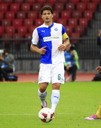 30.07.2014 Zürich Fussball Herren Champions League-Qualifikation Saison 2014 2015 Stadion Letzigrund Grasshopper Club Zürich - OSC Lille Bild zeigt Veroljub Salatic (GC) Aktion Einzelbild Freisteller Foto