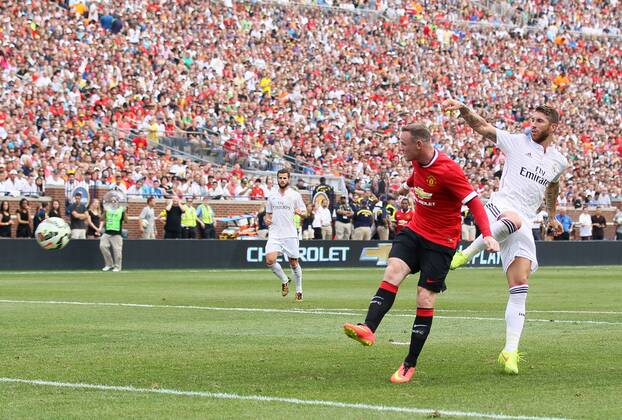 Manchester United s Wayne Rooney scoring his sides second goal - International Champions Cup 2014 - Manchester United vs Real Madrid - Michigan Stadium - Ann Arbor - USA - 2nd August 2014 - Picture David Klein Sportimage EDITORIAL USE ONLY. No use with unauthorised audio, video, data, fixture lists, club league logos or live services. Online in-match use limited to 120 images, no video emulation. No use in betting, games or single club league player publications.