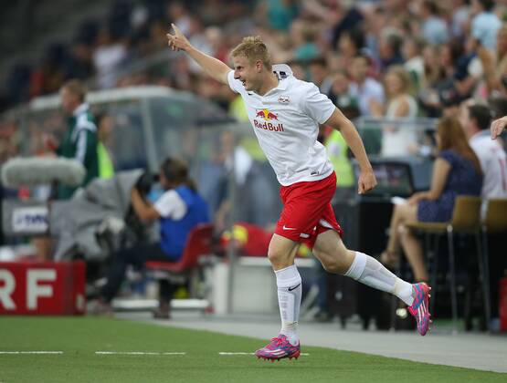 SOCCER - CL, RBS vs Qarabag SALZBURG,AUSTRIA,06.AUG.14 - SOCCER - UEFA Champions League, qualifying, Red Bull Salzburg vs Qarabag Agdam FK. Image shows the rejoicing of Martin Hinteregger (RBS).