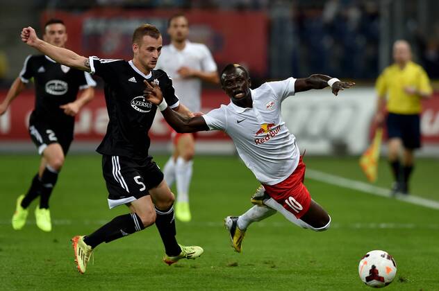 SOCCER - CL, RBS vs Qarabag SALZBURG,AUSTRIA,06.AUG.14 - SOCCER - UEFA Champions League, qualifying, Red Bull Salzburg vs Qarabag Agdam FK. Image shows Maksim Medvedev (Qarabag) and Sadio Mane (RBS).