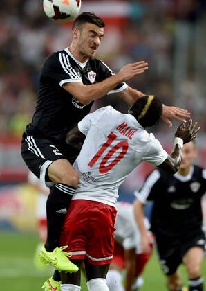 SOCCER - CL, RBS vs Qarabag SALZBURG,AUSTRIA,06.AUG.14 - SOCCER - UEFA Champions League, qualifying, Red Bull Salzburg vs Qarabag Agdam FK. Image shows Qara Qarayev (Qarabag) and Sadio Mane (RBS).