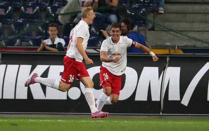 SOCCER - CL, RBS vs Qarabag SALZBURG,AUSTRIA,06.AUG.14 - SOCCER - UEFA Champions League, qualifying, Red Bull Salzburg vs Qarabag Agdam FK. Image shows the rejoicing of Martin Hinteregger and Jonatan Soriano (RBS).
