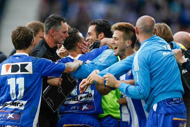 20140817 - GENT, BELGIUM: Gent s Danijel Milicevic (C) celebrates with his teammates after scoring during the Jupiler Pro League match between KAA Gent and Zulte Waregem, in Gent, Sunday 17 August 2014, on day 4 of the Belgian soccer championship. BRUNOxFAHY  04280121
