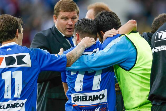 20140817 - GENT, BELGIUM: Gent s Danijel Milicevic (C) celebrates with his teammates and coach Hein Vanhaezebrouck (CL rear) after scoring during the Jupiler Pro League match between KAA Gent and Zulte Waregem, in Gent, Sunday 17 August 2014, on day 4 of the Belgian soccer championship. BRUNOxFAHY  04280147