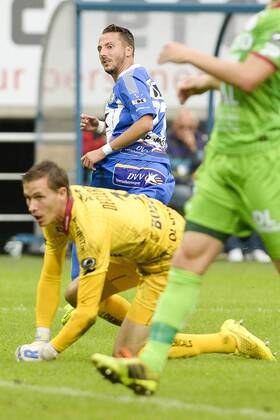 20140817 - GENT, BELGIUM: Gent s Danijel Milicevic (rear) celebrates after scoring during the Jupiler Pro League match between KAA Gent and Zulte Waregem, in Gent, Sunday 17 August 2014, on day 4 of the Belgian soccer championship. LAURIExDIEFFEMBACQ  04280153