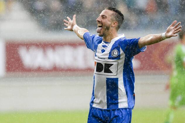 20140817 - GENT, BELGIUM: Gent s Danijel Milicevic celebrates after scoring during the Jupiler Pro League match between KAA Gent and Zulte Waregem, in Gent, Sunday 17 August 2014, on day 4 of the Belgian soccer championship. LAURIExDIEFFEMBACQ  04280371
