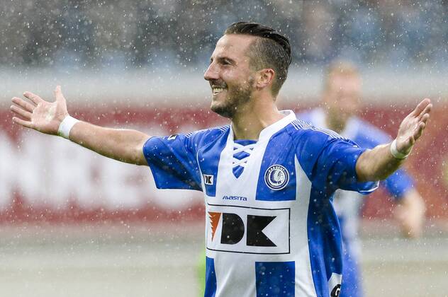 20140817 - GENT, BELGIUM: Gent s Danijel Milicevic celebrates after scoring during the Jupiler Pro League match between KAA Gent and Zulte Waregem, in Gent, Sunday 17 August 2014, on day 4 of the Belgian soccer championship. LAURIExDIEFFEMBACQ  04280374