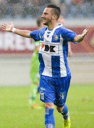 20140817 - GENT, BELGIUM: Gent s Danijel Milicevic celebrates after scoring during the Jupiler Pro League match between KAA Gent and Zulte Waregem, in Gent, Sunday 17 August 2014, on day 4 of the Belgian soccer championship. LAURIExDIEFFEMBACQ  04280375
