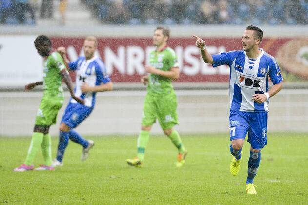 20140817 - GENT, BELGIUM: Gent s Danijel Milicevic celebrates after scoring during the Jupiler Pro League match between KAA Gent and Zulte Waregem, in Gent, Sunday 17 August 2014, on day 4 of the Belgian soccer championship. LAURIExDIEFFEMBACQ  04280382