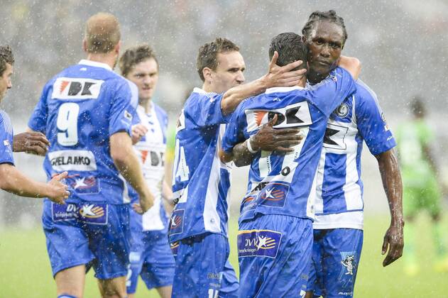 20140817 - GENT, BELGIUM: Gent s Danijel Milicevic and Gent s Habib Habibou celebrate after scoring during the Jupiler Pro League match between KAA Gent and Zulte Waregem, in Gent, Sunday 17 August 2014, on day 4 of the Belgian soccer championship. LAURIExDIEFFEMBACQ  04280386