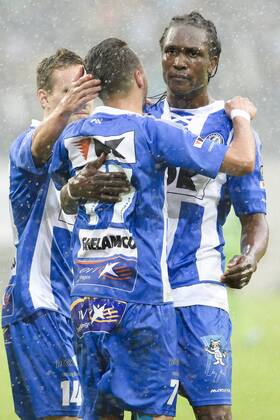 20140817 - GENT, BELGIUM: Gent s Danijel Milicevic and Gent s Habib Habibou celebrate after scoring during the Jupiler Pro League match between KAA Gent and Zulte Waregem, in Gent, Sunday 17 August 2014, on day 4 of the Belgian soccer championship. LAURIExDIEFFEMBACQ  04280388