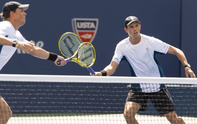 TENNIS - ATP, US Open 2014 NEW YORK CITY,NEW YORK,USA,07.SEP.14 - TENNIS - ATP Tennis Herren World Tour, US Open 2014, Grand Slam, Flushing Meadows, doubles, final. Image shows Bob and Mike Bryan (USA).