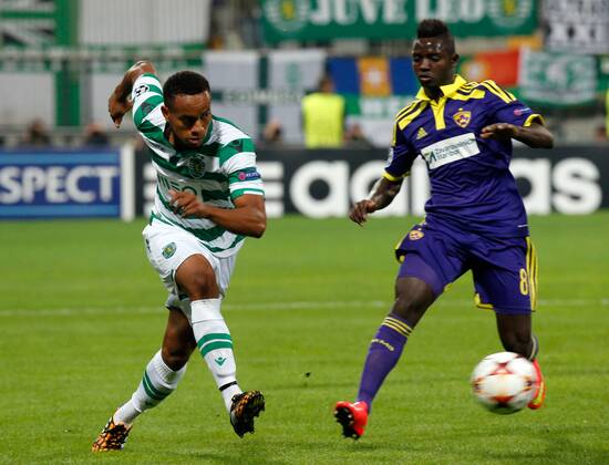 SOCCER - CL, Maribor vs Sporting MARIBOR,SLOVENIA,17.SEP.14 - SOCCER - UEFA Champions League, group stage, NK Maribor vs Sporting Clube de Portugal. Image shows Andre Carrillo (Sporting) and Sintayehu Sallalich (Maribor). 