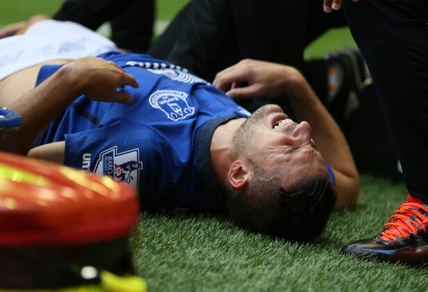 Kevin Mirallas of Everton pulls up with a hamstring problem - Barclays Premier League - Liverpool vs Everton - Anfield Stadium - Liverpool - England - 27th September 2014 - Picture Simon Bellis Sportimage EDITORIAL USE ONLY. No use with unauthorised audio, video, data, fixture lists, club league logos or live services. Online in-match use limited to 120 images, no video emulation. No use in betting, games or single club league player publications.