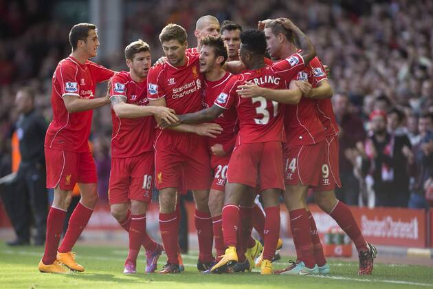 Adam Lallana of Liverpool celebrates his opening goal - Liverpool FC vs. West Bromwich Albion - Barclay s Premier League - Anfield - Liverpool - 04 10 2014 Pic PhilipxOldham Sportimage EDITORIAL USE ONLY. No use with unauthorised audio, video, data, fixture lists, club league logos or live services. Online in-match use limited to 120 images, no video emulation. No use in betting, games or single club league player publications.