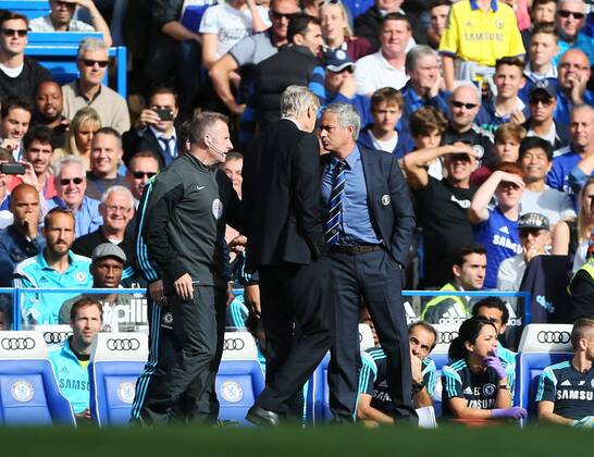 Chelsea s Jose Mourinho and Arsenal s Arsene Wenger square up to each other - Barclays Premier League - Chelsea Vs Arsenal - Stamford Bridge - England - 5th October 2014 - Picture David Klein Sportimage EDITORIAL USE ONLY. No use with unauthorised audio, video, data, fixture lists, club league logos or live services. Online in-match use limited to 120 images, no video emulation. No use in betting, games or single club league player publications.