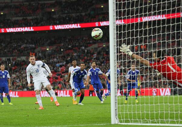 England s Wayne Rooney scoring his sides second goal - Euro 2016 Qualification - England vs San Marino - Wembley Stadium - England - 9th October 2014 - Picture David Klein Sportimage EDITORIAL USE ONLY. No use with unauthorised audio, video, data, fixture lists, club league logos or live services. Online in-match use limited to 120 images, no video emulation. No use in betting, games or single club league player publications.