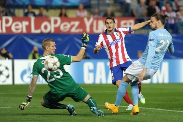 Atletico de Madrid Midfielder, Jorge Resurreccion Merodio - KOKE, number 6 celebrates after scoring a goal (1,0). Malmo FF Midfielder, Erik Johansson - ERIK JOHANSSON, number 21. Malmo FF Goalkeeper, Robin Olsen - ROBIN OLSEN, number 25. Round 3 of the CHAMPIONS league, soccer match between Atletico de Madrid - Malmo FF at the Vicente Calderon estadium, Madrid - Spain by October 22, 2014. PHOTO: MIguelLopez.