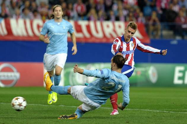 Atletico de Madrid Forward, Antoine Griezmann - GRIEZMANN, number 7 celebrates after scoring a goal (3,0). Malmo FF Defender, Filip Helander - FILIP HELANDER, number 4. Malmo FF Midfielder, Erdal Rakip - ERDAL RAKIP, number 5. Malmo FF Midfielder, Erik Johansson - ERIK JOHANSSON, number 21. Round 3 of the CHAMPIONS league, soccer match between Atletico de Madrid - Malmo FF at the Vicente Calderon estadium, Madrid - Spain by October 22, 2014. PHOTO: MIguelLopez.